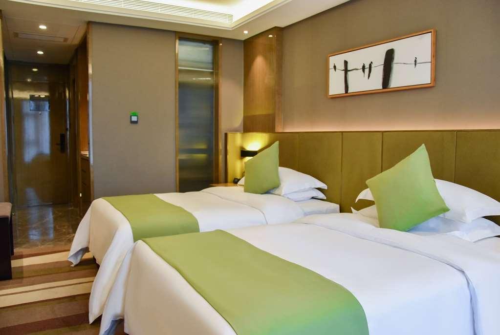 Leshan Ramada Hotel Quarto foto