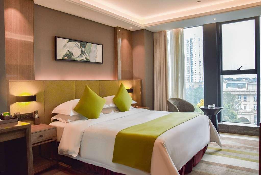 Leshan Ramada Hotel Quarto foto