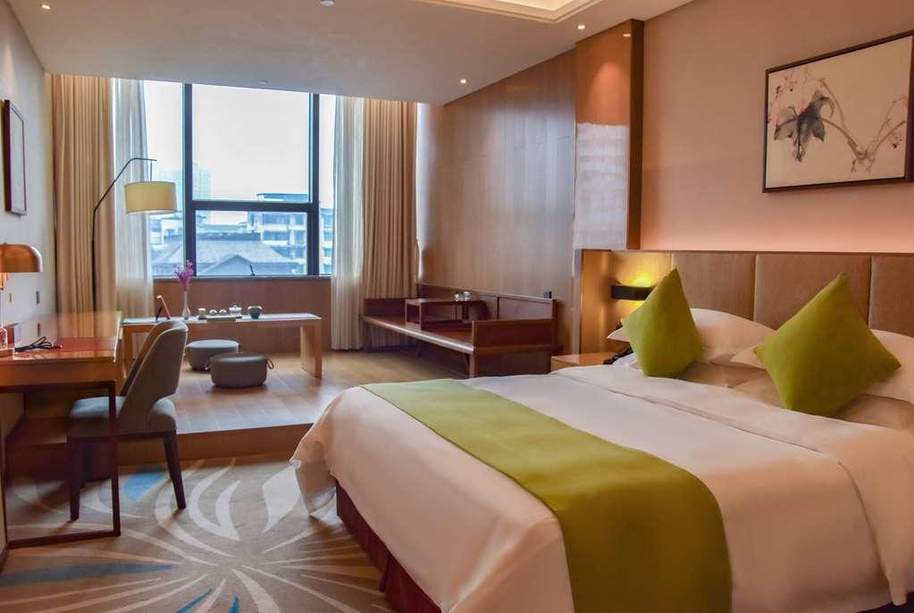 Leshan Ramada Hotel Quarto foto