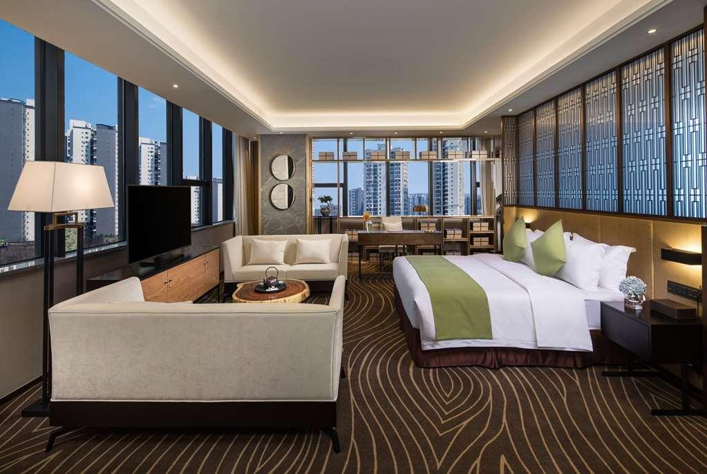 Leshan Ramada Hotel Quarto foto