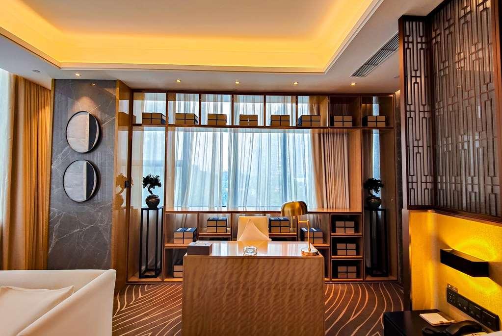 Leshan Ramada Hotel Quarto foto