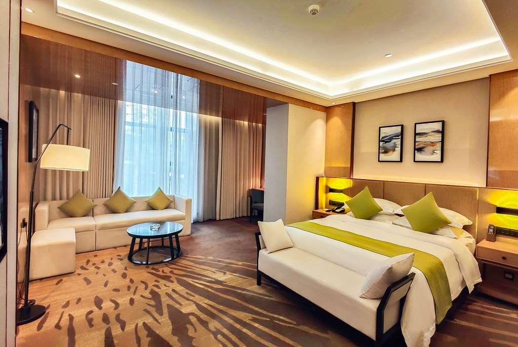 Leshan Ramada Hotel Quarto foto