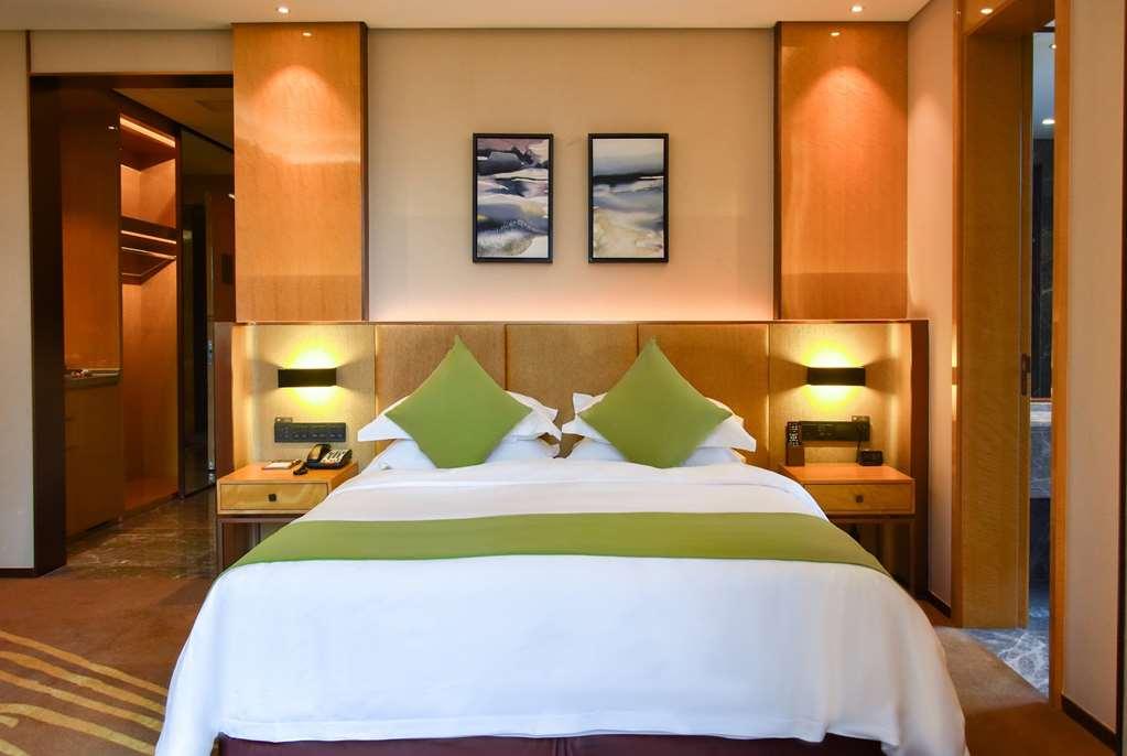 Leshan Ramada Hotel Quarto foto