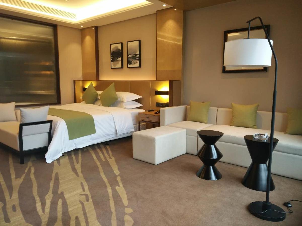 Leshan Ramada Hotel Quarto foto